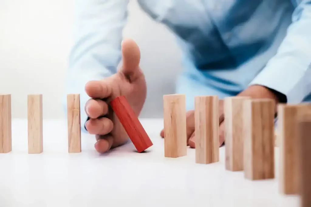 Leadership and Change management being shown by dominoes