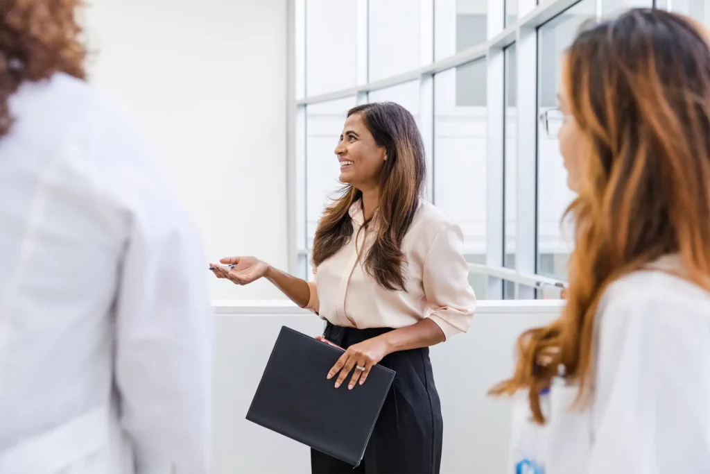 Health care manager working with doctors